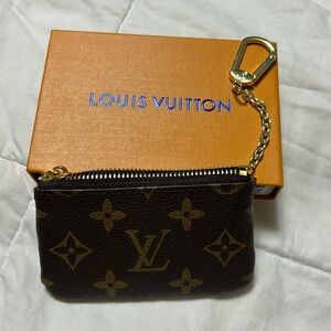 Louis Vuitton card/coin/key holder.  Brand new